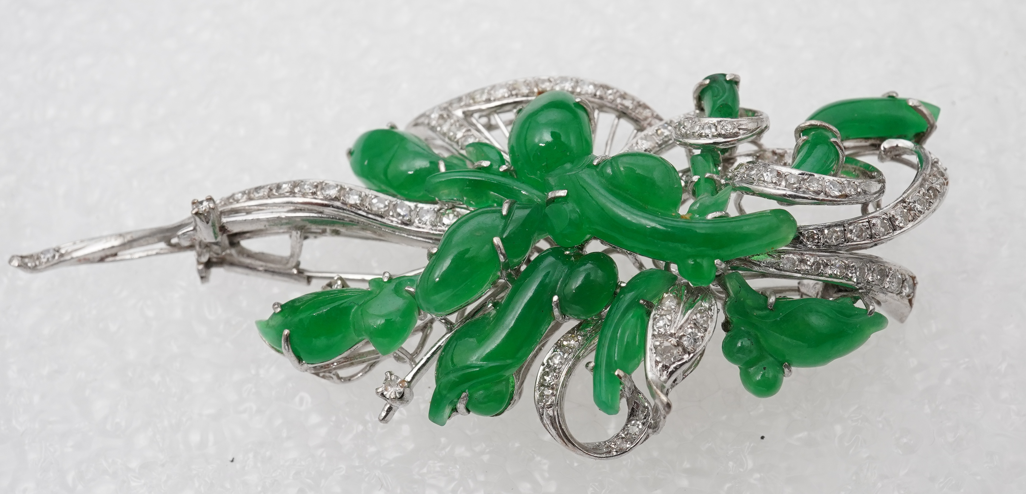 A fine jadeite and diamond brooch, 1960s